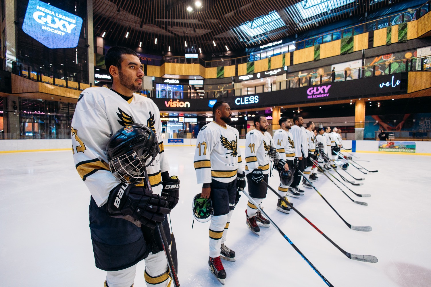Adult ice hockey players on the ice in Dubai